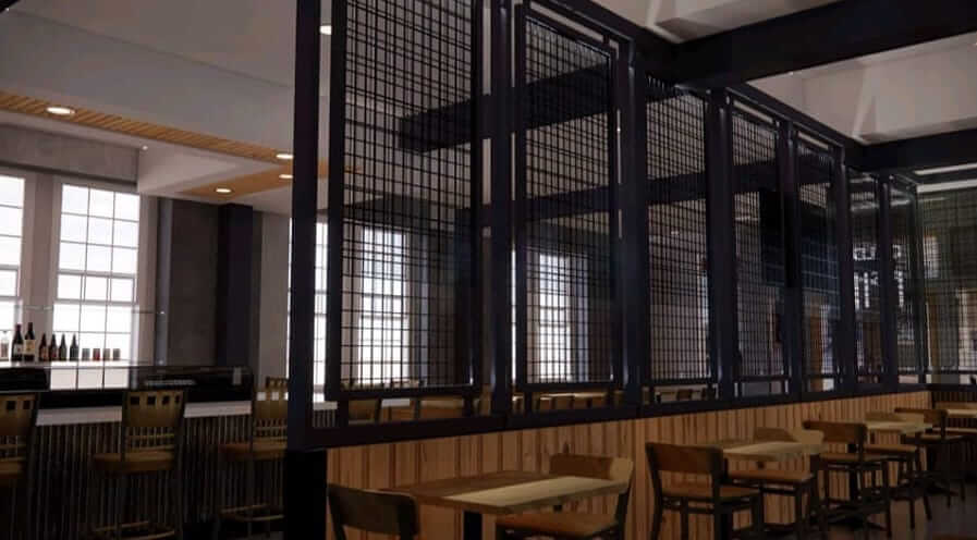 Mock-up of the restaurant's interior, which features a black metal and wooden wall separating seating.